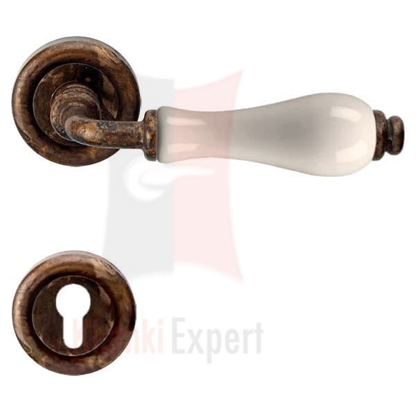 Klamka DALIA 602 AN patynowany antyczny (porcelana kremowa) z rozetą na wkładkę
