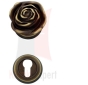 Gałka obrotowa Rose z dolna rozetą na wkładkę. Kolor BM brązowiony matowy, ciemny.
