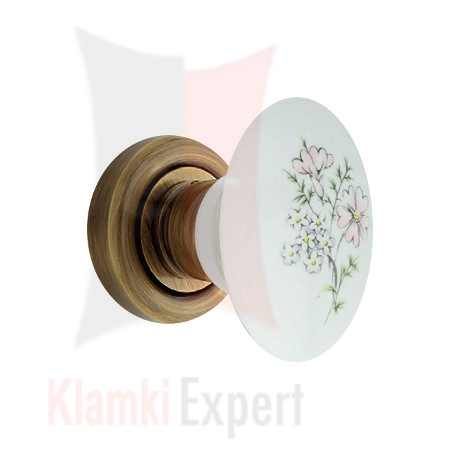 Klamka FLAVIA 686, porcelana biała z kwiatem Margherita, rozeta 103 OG brązowiony przecierany