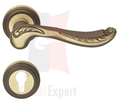 Klamka Lady 011 z dolną rozetą na wkładkę patentową